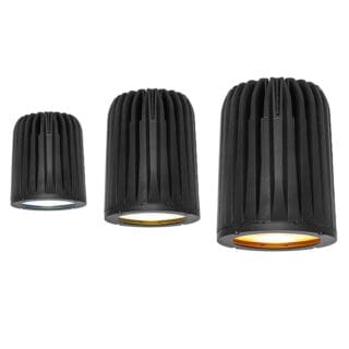 Three black cylindrical LED downlights of varying sizes, each with a ribbed design and a colored inner ring—white, yellow, and orange—offer stylish lighting solutions, beautifully displayed against a white background.