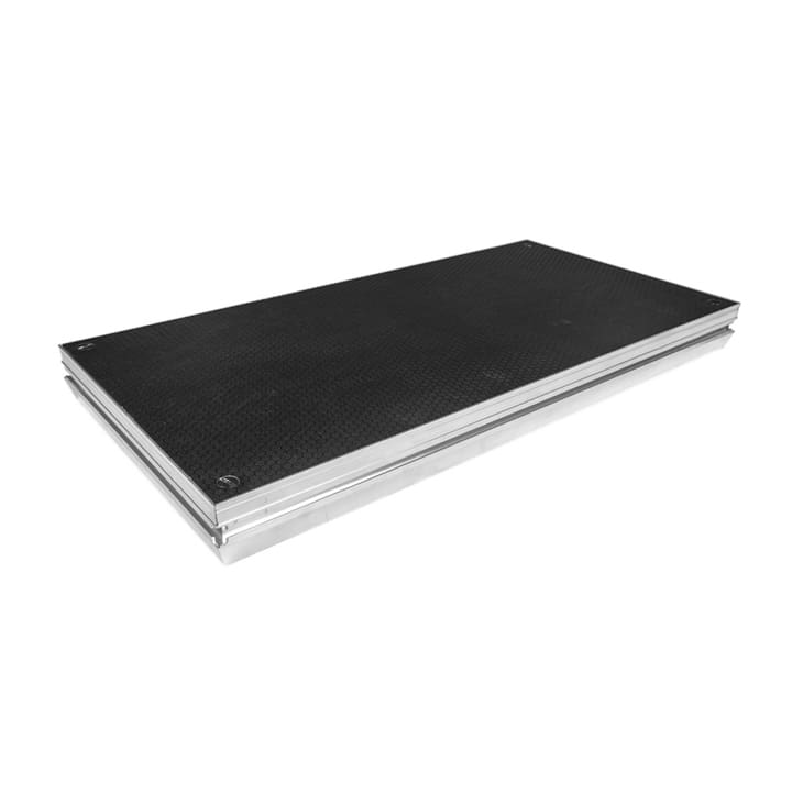 A rectangular black and silver portable stage platform with a textured surface, ideal for lighting, audio, or video setups, shown against a white background.
