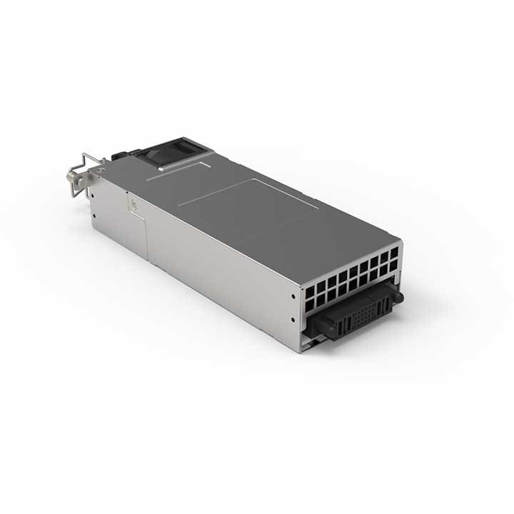 A rectangular, metallic power supply unit for lighting or audio equipment, with a vented front, a black connector, and a handle on the side, placed on a plain white background.