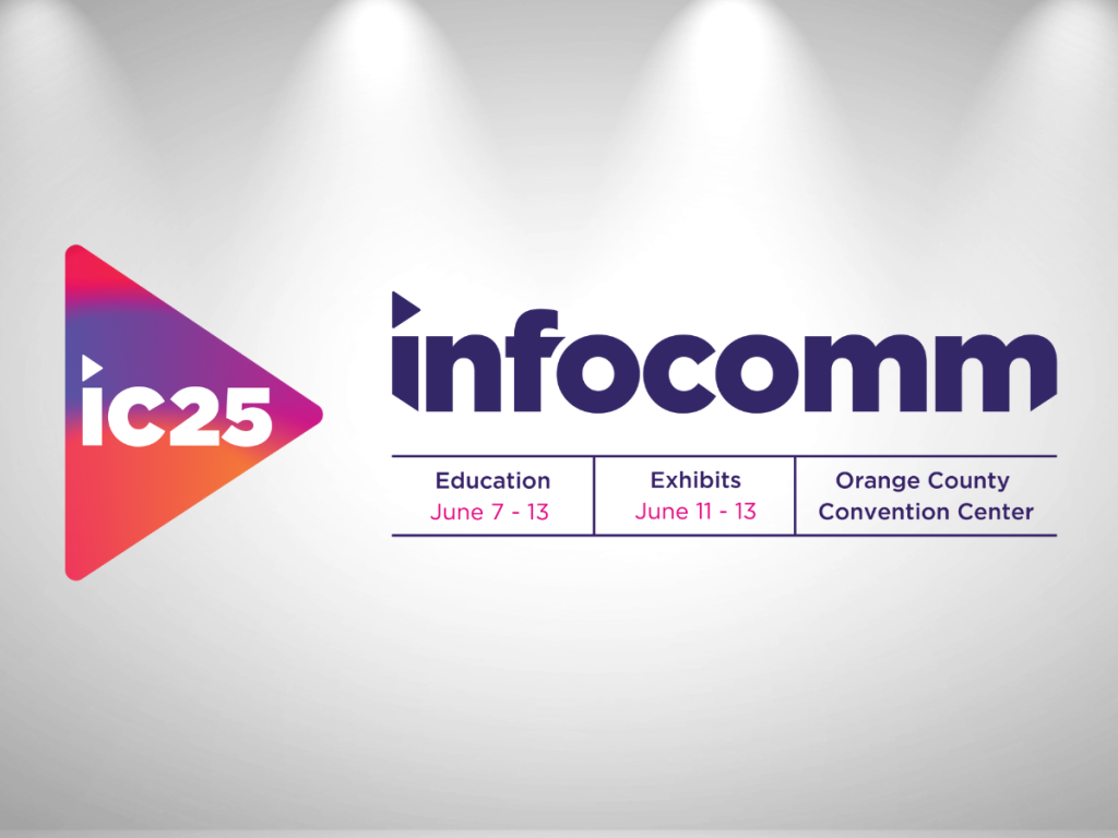 A sign for InfoComm 2025 with a purple and red play button logo and the text ic25. Details include Education: June 7-13, Exhibits: June 11-13, Orange County Convention Center.